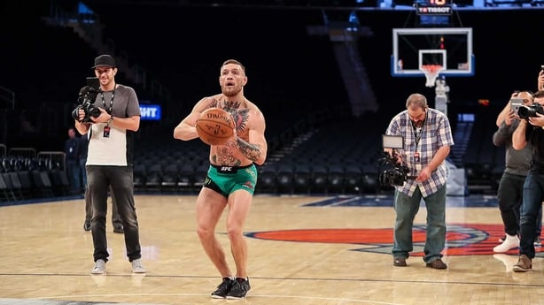 McGregor shoots a hoop