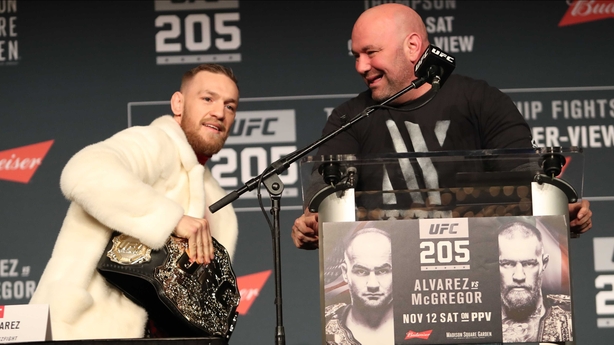 McGregor grabs Alvarez's belt
