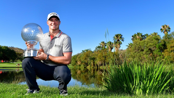 Alex Noren poses with his trophy at the Gary Player Country Club