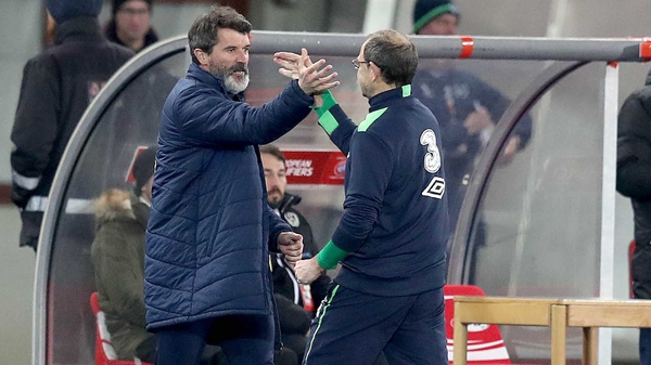 Roy Keane (L) and Martin O'Neill celebrate in Vienna