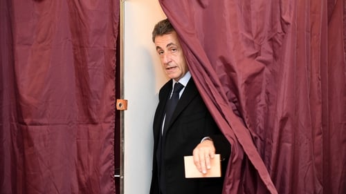 Former French president Nicolas Sarkozy pictured voting in Paris earlier today