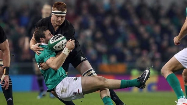 Henshaw is tackled by Sam Cane 