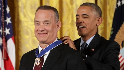 Tom Hanks looks suitably chuffed with his Presidential Medal of Freedom