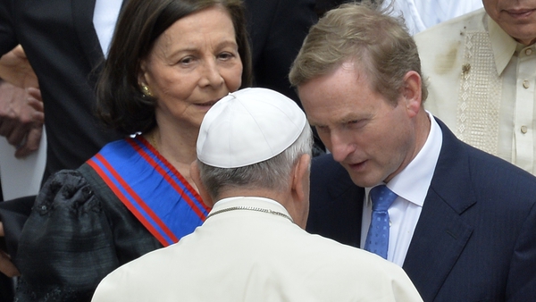 Enda Kenny speaks to Pope Francis at the canonisation of Popes John XIII and John Paul II in 2014