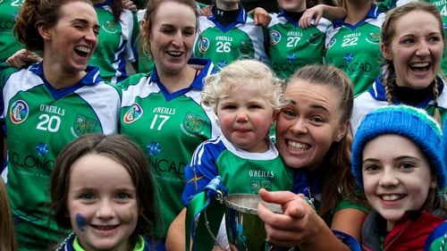 Two-year-old Aoibh Doran celebrates with her Auntie, Johnstownbridge Captain Jenna Murphy