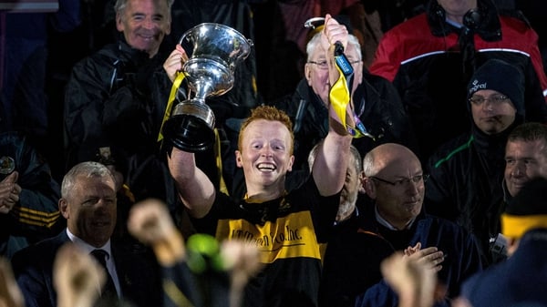 Crokes captain Johnny Buckley breaks the handle of the cup after lifting it up in Mallow