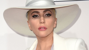 Lady Gaga has opened up about the pressures of relationships and fame