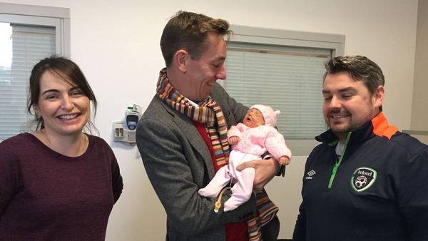 Tubridy holding baby Holly