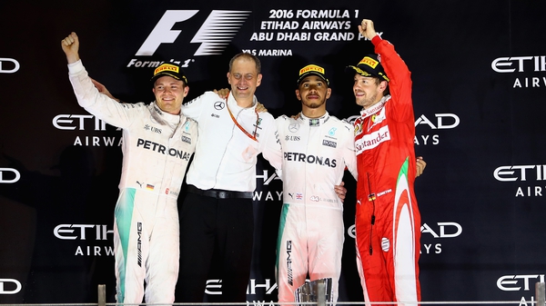Sebastian Vettel on the podium in Abu Dhabi along with the now retired Nico Rosberg and Lewis Hamilton