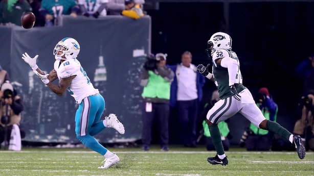 Kenny Stills takes a touchdown pass