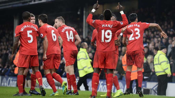 Liverpool players celebrate Sadio Mane's late, late Merseyside derby winner