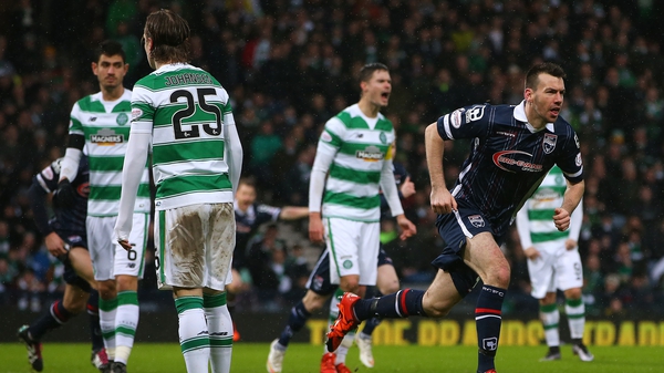 Paul Quinn celebrates scoring against Celtic in the Scottish League Cup semi-final