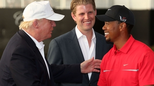 Donald Trump and Tiger Woods pictured in 2013
