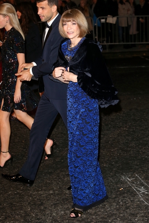 Queen of fashion, Anna Wintour looks festive in cool blue