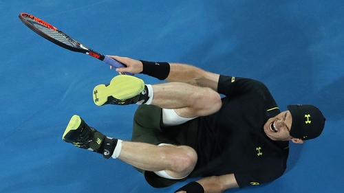 Andy Murray hits the deck at the Rod Laver Arena