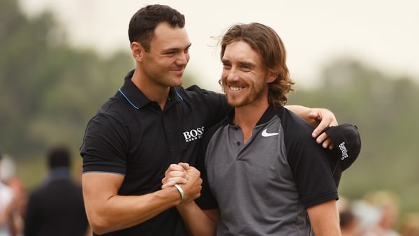 Tommy Fleetwood is congratulated by Martin Kaymer