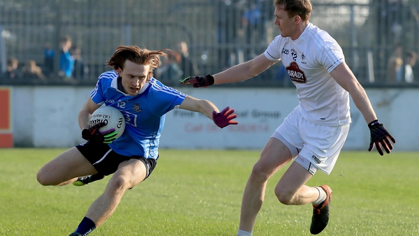 Niall Walsh tries to escape the attentions of Paul Cribbin