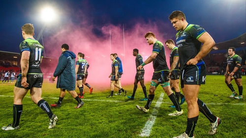 Connacht players leave the pitch dejected