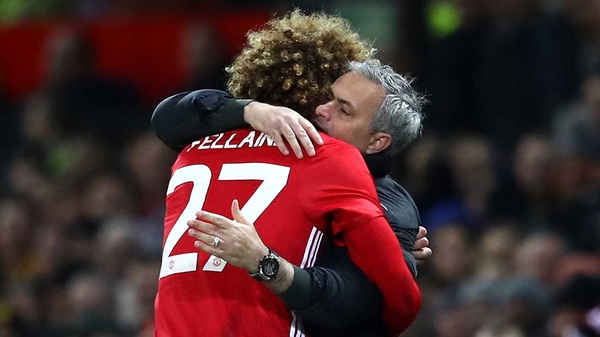 Jose Mourinho and Marouane Fellaini hug it out