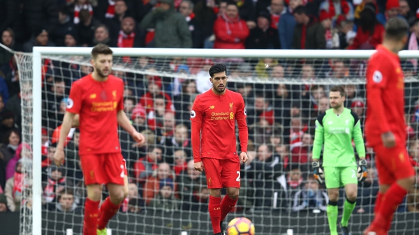 Dejected Liverpol players during the recent defeat against Swansea