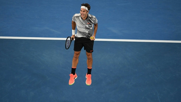 Federer celebrates victory over Nadal