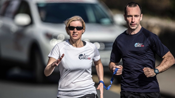 Sinead Kane (l) crossed the line in Sydney to enter the record books