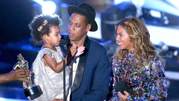 Blue Ivy, Jay Z and Beyoncé -
now the baby twins can play their part in building the Carter empire