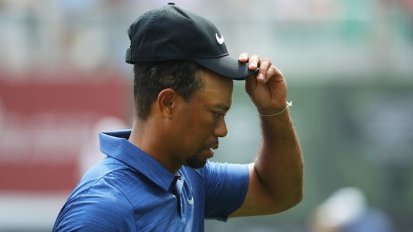 Tiger Woods is working hard to get the spasms down