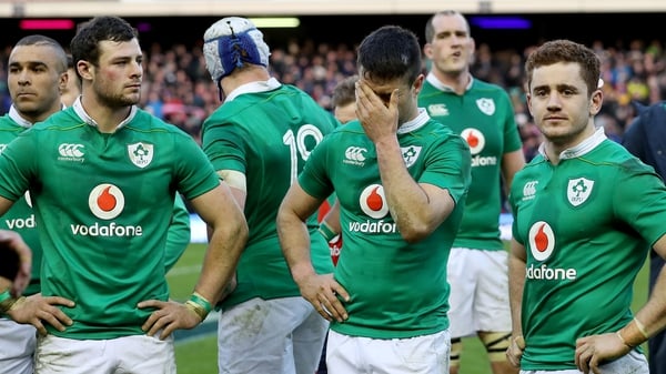 Ireland players look on following the Murrayfield defeat - head coach Schmidt wasn't impressed