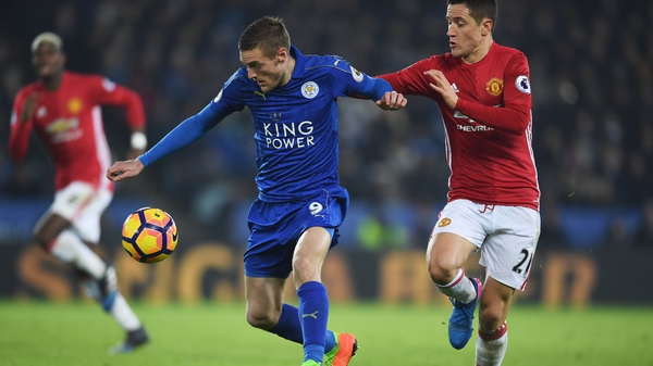 Ander Herrera (R) tackles Leicester's Jamie Vardy last weekend
