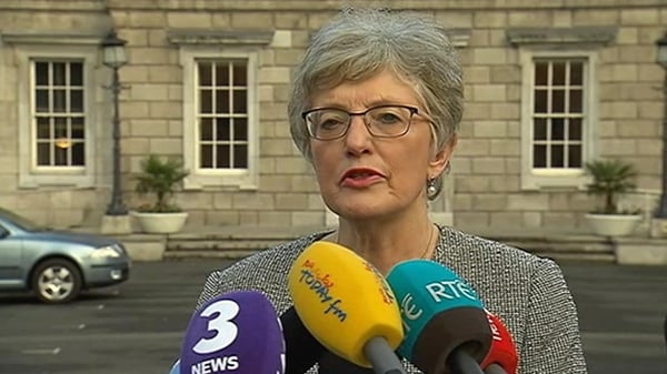 Katherine Zappone addressing reporters outside the Dáil