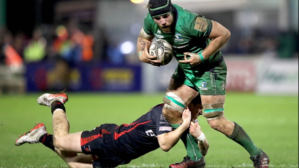 Connacht's Jake Heenan is tackled by Sam Beard of Dragons in Galway