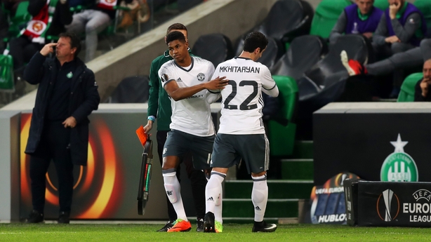 Henrikh Mkhitaryan leaves the field injured