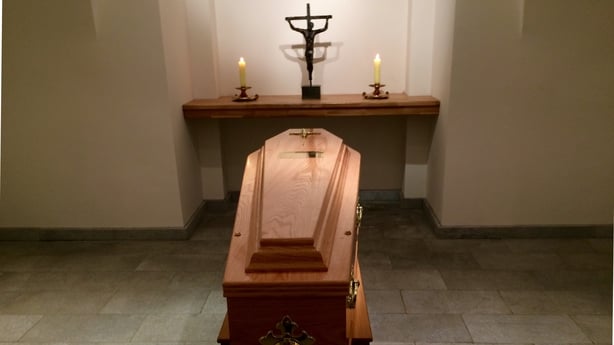 Cardinal Desmond Connell's coffin was carried in procession to the cathedral's crypt