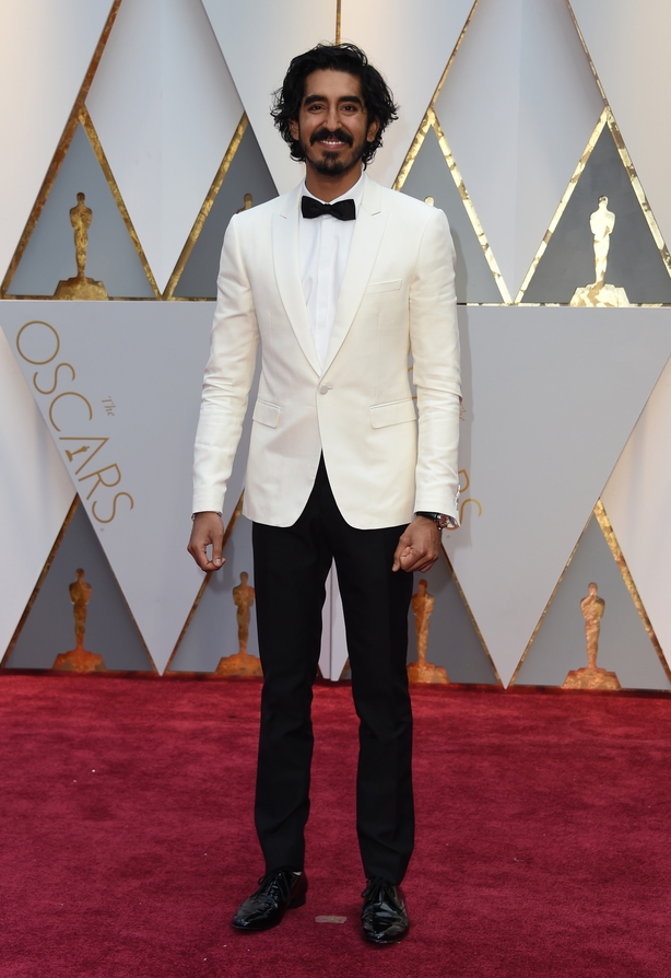 John Legend Wears Gucci Tuxedo for Oscars 2017 Red Carpet