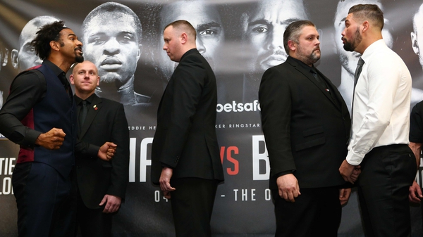 David Haye and Tony Bellew stand separated by bouncers