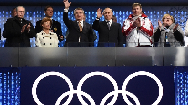 Russian President Vladimir Putin (3rd from right) at the Sochi 2014 closing ceremony