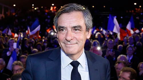 Francois Fillon arrives at a presidential campaign political rally in Nimes, Southern France, earlier today