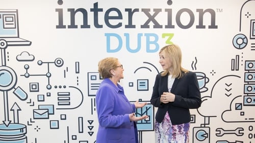Tánaiste Frances Fitzgerald (L) speaks with Managing Director of Interxion Ireland Tanya Duncan (R)