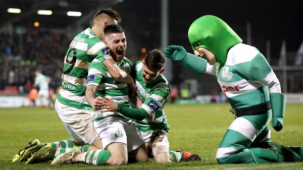 Brandon Miele celebrates his opener with his Shamrock Rovers team-mates and Hooperman