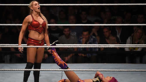 Flair (standing, with Sasha Banks on the mat) - "Negative comments in terms of body image are the hardest thing the women probably struggle with"