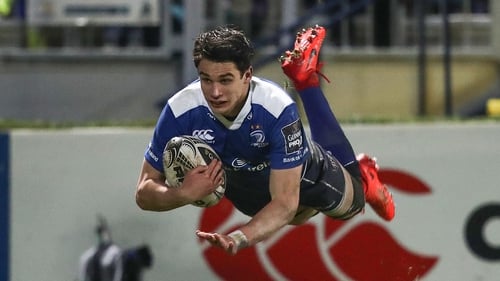 Joey Carbery goes over for one of his two tries against the Scarlets