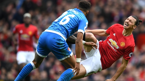 Tyrone Mings (L) and Zlatan Ibrahimovic clashed at Old Trafford