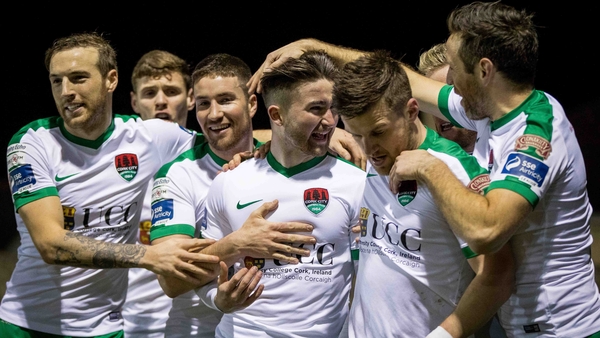 Cork City players congratulate goal scorer Sean Maguire