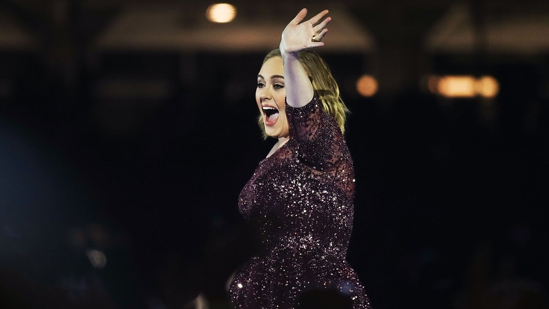 Adele thrilled as fan proposes on stage