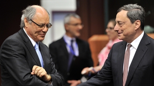 Malta's Finance Minister Edward Scicluna with ECB chief Mario Draghi