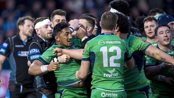 Glasgow's Finn Russell holds back Bundee Aki of Connacht as tempers flare