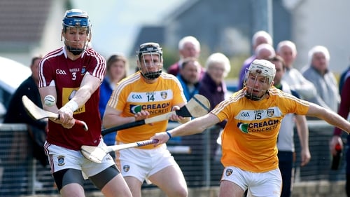 Westmeath's Tommy Doyle in action against Antrim's Deaghlan Murphy