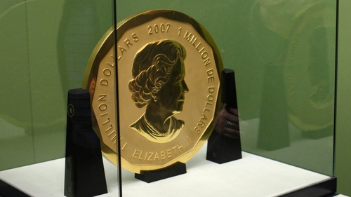 The coin features Britain's Queen Elizabeth
