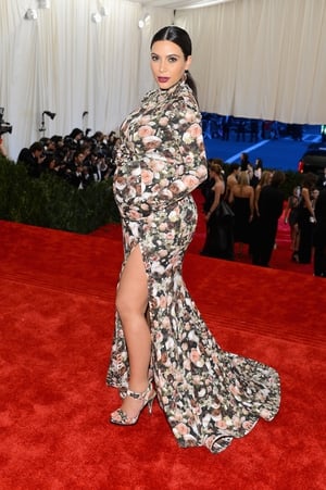Kim got a lot of bad reviews for wearing this floral Ricardo Tisci dress at the Met Ball in 2013 but we think she rocked her red carpet maternity wear.